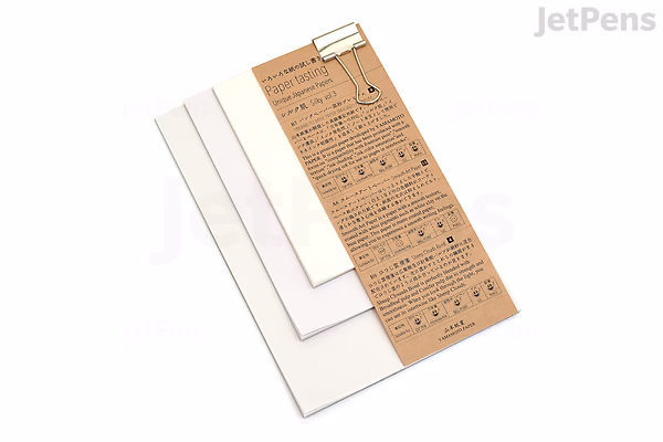 A set of Yamamoto Paper Tasting Silky Vol. 3 sheets, showcasing different textured and colored paper samples arranged in a fan-like manner on a white background.