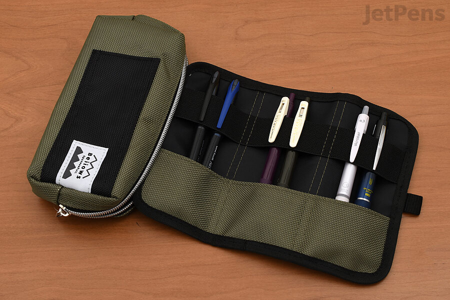 The Concise Bellows Pen Case combines a roll up case with a zipper pouch for security.
