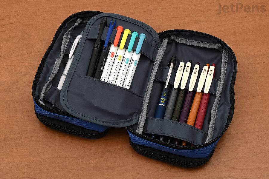 The Lihit Lab Triple Zipper Book Style Pen Case can hold up to fifty-five pens!