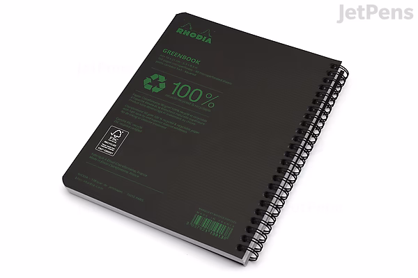 Spiral-bound Rhodia Greenbook notebook measuring 6 by 8.3 inches with a black cover featuring green text and icons, indicating it contains 100% recycled graph paper.