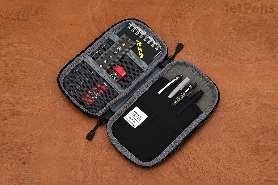 The slim Lihit Lab Smart Fit Actact Compact Pen Case features a protective cushioned interior and a water-repellent exterior, a perfect combination for the best EDC pencil case.