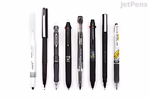 A lineup of seven pens arranged horizontally on a white background, labeled as JetPens Hobonichi Techo Recommended Pens Sampler. The pens vary in design and color, mostly black with some white and silver accents.