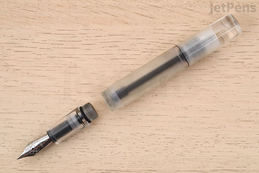 This type of fountain pen fills from an ink bottle with an eyedropper.