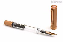 A TWSBI ECO Caffè Bronze Limited Edition fountain pen with an extra fine nib. The pen is shown uncapped, with the bronze-colored cap standing upright beside it. The pen body is transparent, revealing the internal ink reservoir and piston mechanism.