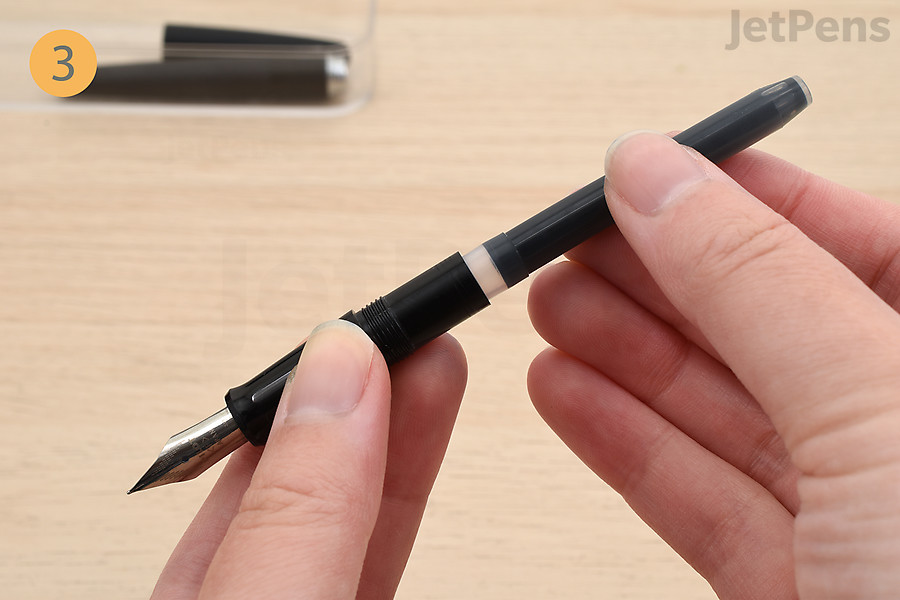 Firmly insert the cartridge into the fountain pen’s grip section.
