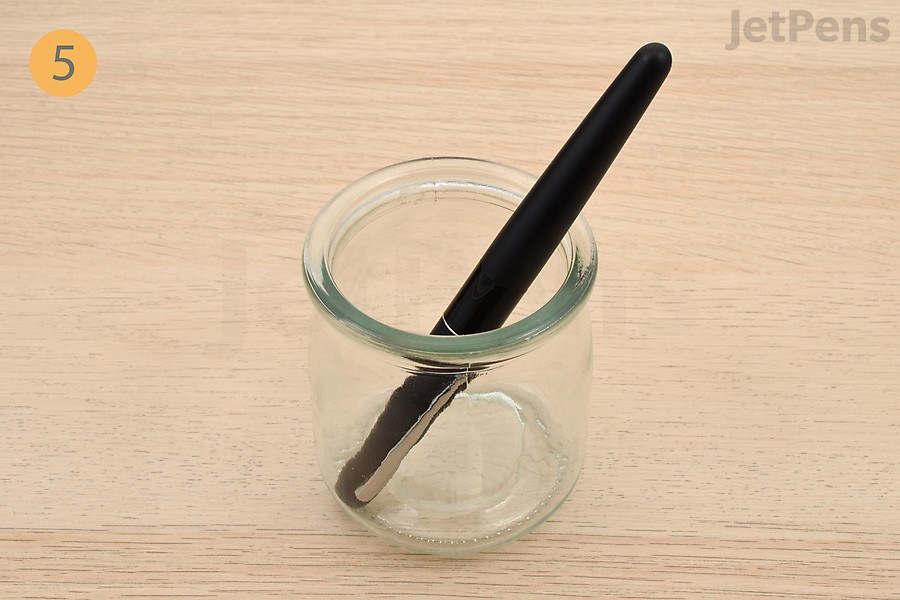 Let the pen sit for at least fifteen minutes.