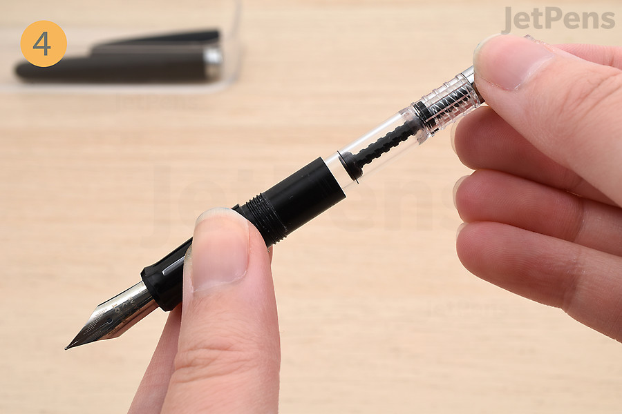 Twist the piston knob to extend the piston.