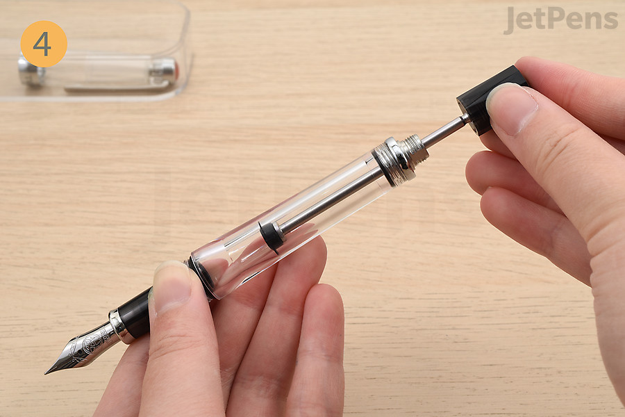 Push the knob down until you feel resistance.