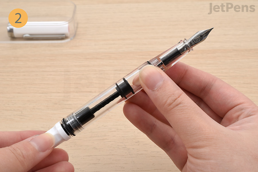 Twist the piston knob to extend the piston.