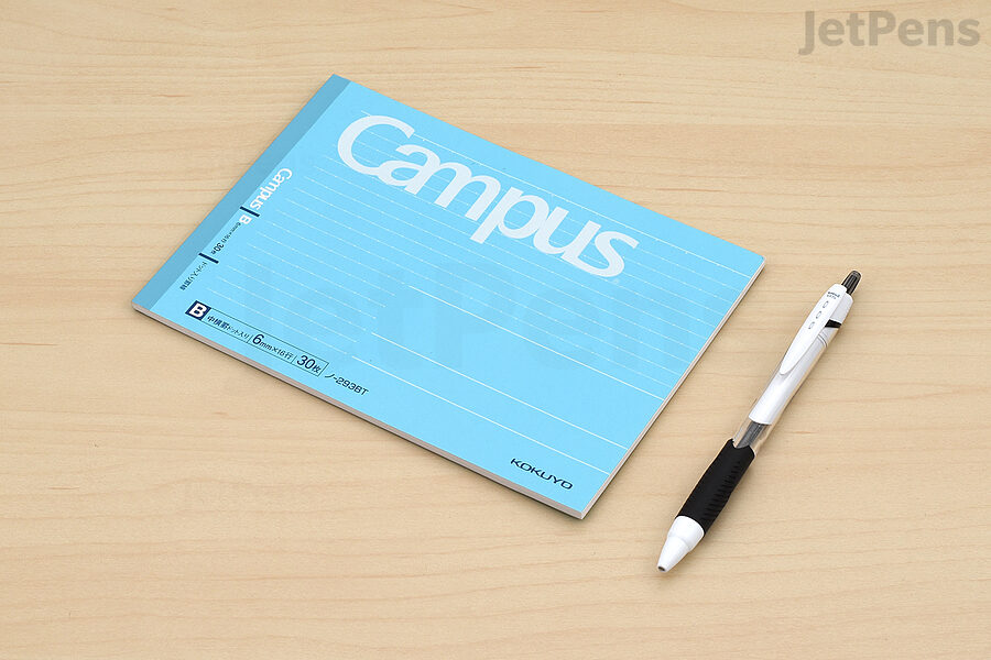 The Kokuyo Campus Half Size Notebook tucks neatly in front of or under a keyboard.