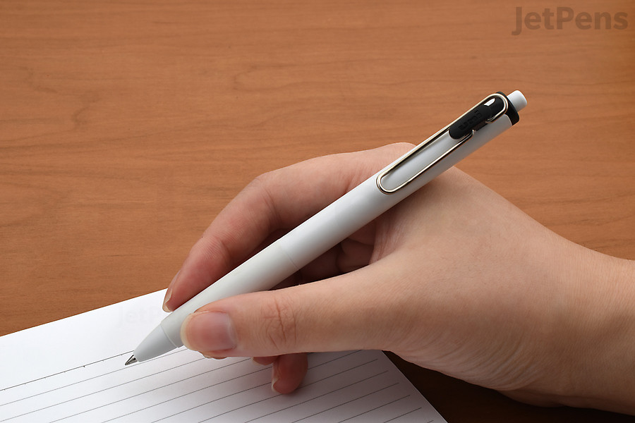 The Uni-ball One Gel Pen uses specially formulated ink with large pigment particles that stay on the surface of the paper.