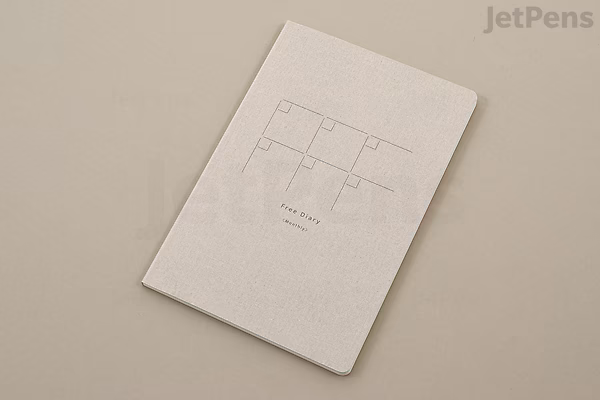 Gray Midori Yuru Log Notebook in B6 size with MD Thick paper, featuring a simple cover design and free monthly diary layout inside.