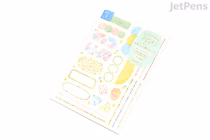 Two sheets of Midori Yuru Log removable watercolor stickers featuring various pastel-colored designs such as fruits, plants, stationery items, and decorative labels.