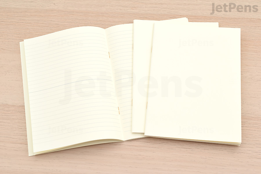 The Midori MD Notebook Light is lightweight and has fewer pages and uses staple bindings.