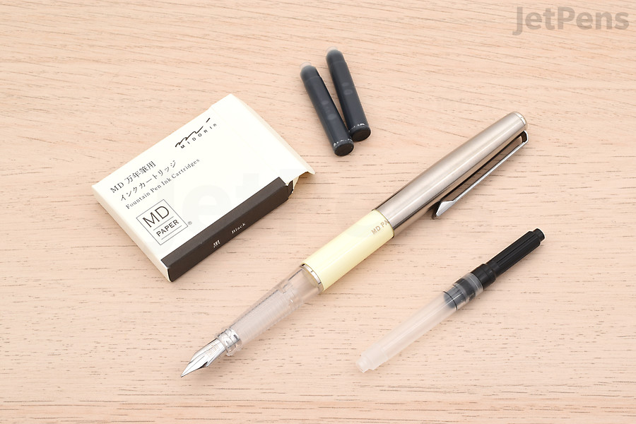 The Midori MD Fountain Pen has a cream-colored barrel that matches MD Notebooks. Fill it with cartridges or converters.