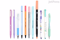 A collection of nine pastel-colored pens and markers arranged in a row on a white background. The colors include shades of purple, blue, pink, orange, green, and white, featuring various pen types such as gel pens, fineliners, and markers.