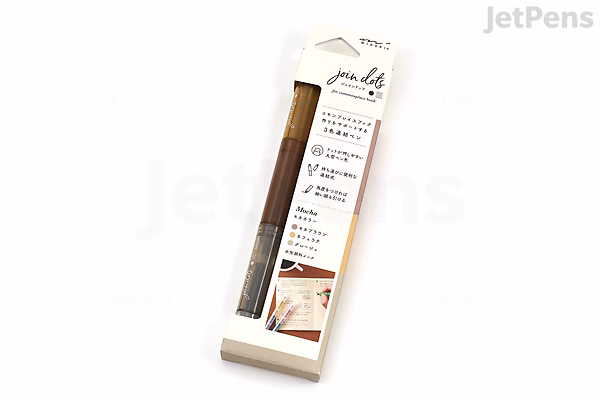 A packaged set of three Midori Join Dots Connecting Markers in mocha colors. The markers are slim and displayed vertically in a clear plastic case with a white and brown label showing product information and a small illustration of the markers in use.