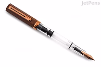 A TWSBI ECO Espresso fountain pen with a bronze-colored cap and nib, featuring a transparent barrel and a medium nib size.