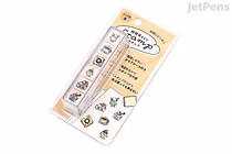 Kamio Japan Favorites Stamp Set featuring cafe-themed stamps including coffee cups, utensils, and food items, displayed on a beige backing card with Japanese text and illustrations.