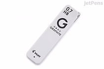 A white rectangular container labeled "Pilot Neox High-Purity Graphite Pencil Lead" holding 0.7 mm HB leads, with a large "G" and "GRAPHITE" written on the front.