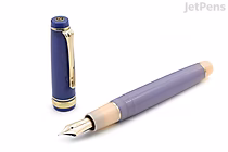 Sailor Pro Gear Dreamy Hour limited edition fountain pen with 21k fine nib, shown uncapped with cap beside it. The pen features a sleek, elegant design.