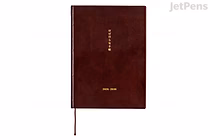 Burgundy leather-like Hobonichi 5-Year Techo A5 planner (2026–2030) with vertical gold-foil Japanese title, small gold "Hobonichi" text on cover and a matching ribbon bookmark.