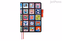 A5 Hobonichi Techo Cousin planner with black cover featuring a colorful grid of illustrated white cats in playful scenes, red elastic strap and two pink/red ribbon bookmarks.