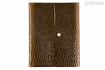 Hobonichi Techo Cousin A5 English planner cover "Nothing to Hide" (Black), crocodile-embossed leather texture, open flat view with central snap closure.