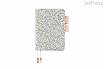 A6 Hobonichi Techo Original planner in Liberty Sasha Kiora floral fabric cover, pastel multicolor pattern, pink pen loop and two pink ribbon bookmarks with bead ends, 2026 January start.