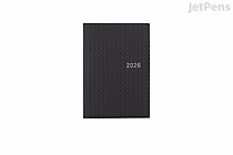 Hobonichi Techo HON A6 English planner, black gingham cover with subtle diamond/check pattern and small centered "2026" text.