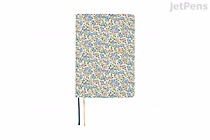 A6 Hobonichi Techo planner (2026 Jan start) with Liberty Fabrics Sasha Kiora multicolored small floral cover and two ribbon bookmarks (blue and yellow).