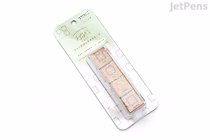 Packaged Midori Yuru Log paintable pre-inked stamp set showing three rectangular frame designs on a pale green header card in clear blister packaging.