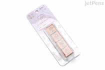 Packaged Midori "Yuru Log" pre-inked paintable stamp set in pastel blister pack, rectangular stamp with three small decorative panels labeled "Sweet."