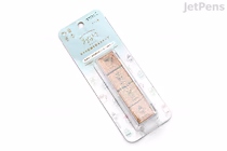 Packaged Midori Yuru Log paintable pre-inked stamp set in "Cafe" design—four small rectangular stamps on pastel blue blister card backing.