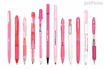 Assorted pink pens and mechanical pencils in various shades and styles lined up on a white background — JetPens Pink Pen Sampler.