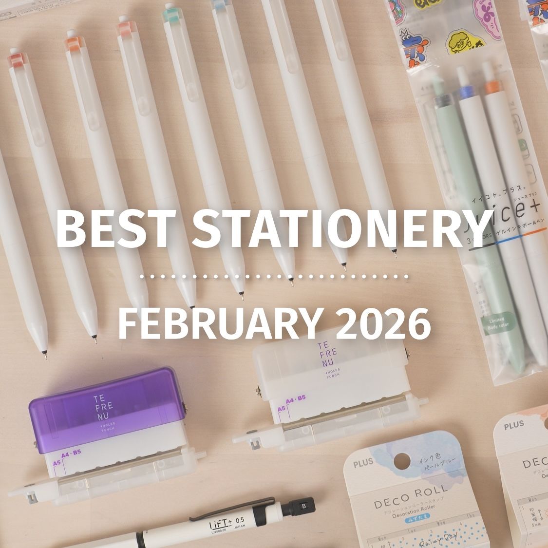 Flat lay of pastel and white stationery on beige background: pens, markers, correction tape, eraser, small label stamp and packaged sticky notes neatly arranged.